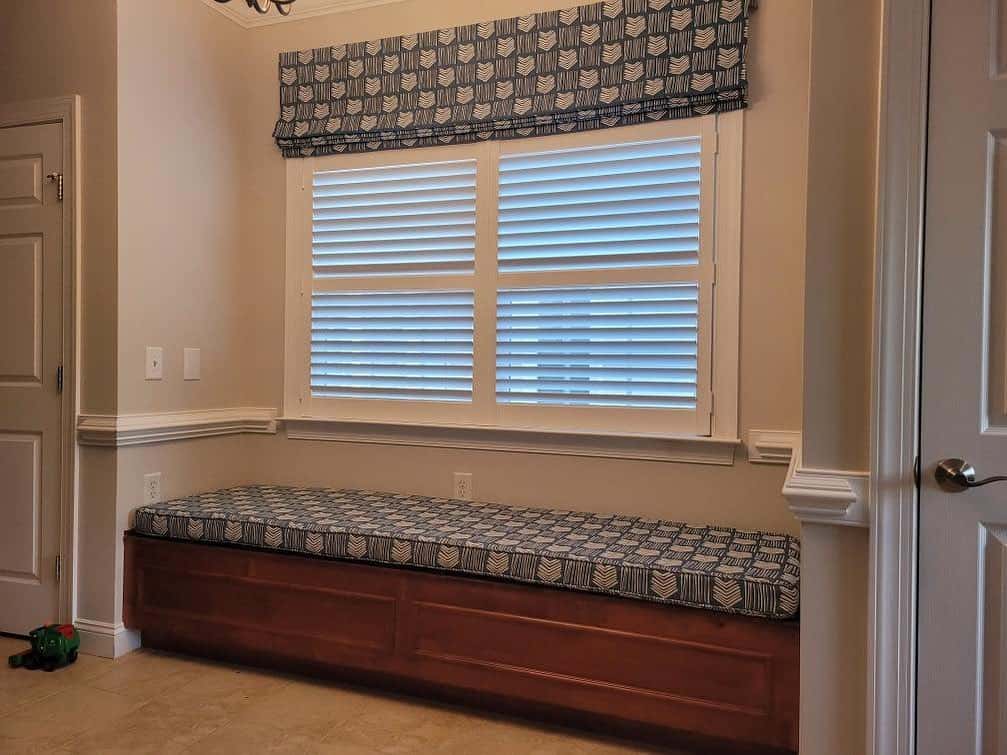 custom valance and shade with matching bench cushion.