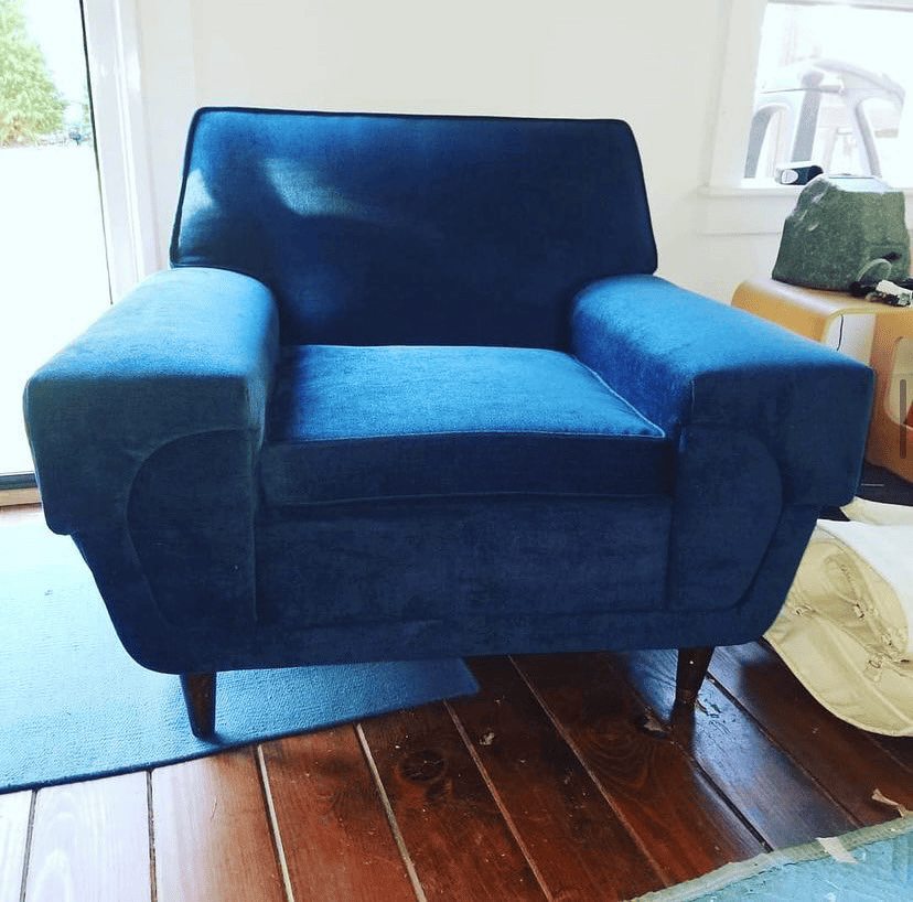 re-upholstered blue velvet modern chair