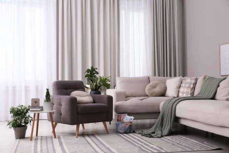 Elegant living room with stylish curtains and comfortable seating.