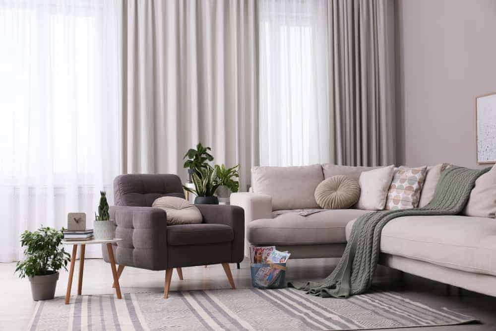 Elegant living room with stylish curtains and comfortable seating.